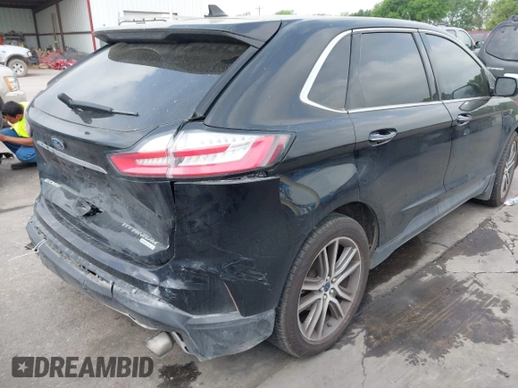 2020 Ford Edge Titanium z VIN 2FMPK3K92LBB24713, wystawiony jako IAAI lot #41949412 z przebiegiem 97 014 mil mil oraz . Historia ofert i sprzedaży dostępna na DreamBid. Obrazek 4.