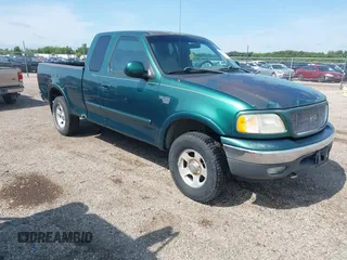 1999 Ford F-150 XL with VIN 2FTRX18LXXCA38121, listed as a IAAI auction lot 42758364 with 131,085 mi miles and . Bid and sale history available at DreamBid. Image 1.