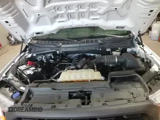 2021 Ford F-150 XL с VIN 1FTFX1E57MKE24706, выставлен на аукционе Copart как лот 54882605 с пробегом 100 692 миль миль и Чистый • Clean title. История ставок и продаж доступна на DreamBid. Изображение 13.