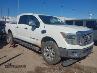 2016 Nissan Titan SL z VIN 1N6BA1F21GN504118, wystawiony jako IAAI lot #41729710 z przebiegiem 127 760 mil mil oraz . Historia ofert i sprzedaży dostępna na DreamBid. Obrazek 1.