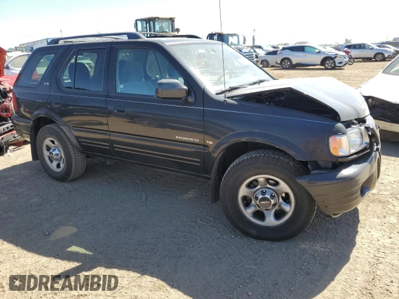 2001 Isuzu Rodeo S with VIN 4S2DM58W914354772, listed as a Copart auction lot 72208564 with 146,507 mi miles and Salvage Title. Bid and sale history available at carsss.com. Image 4.