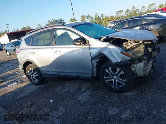 2017 Toyota RAV4 LE with VIN 2T3BFREV1HW607984, listed as a IAAI auction lot 41878970 with 136,941 mi miles and . Bid and sale history available at DreamBid. Image 13.