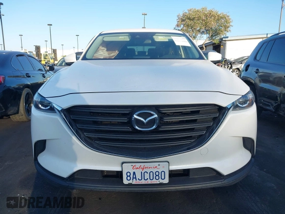 2018 Mazda CX-9 Sport with VIN JM3TCABY8J0204499, listed as a IAAI auction lot 42374933 with 114,408 mi miles and . Bid and sale history available at DreamBid. Image 12.