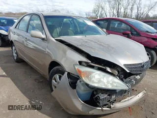 2003 Toyota Camry LE with VIN 4T1BE32KX3U123873, listed as a IAAI auction lot 42085492 with 166,901 mi miles and . Bid and sale history available at DreamBid. Image 1.