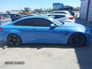 2015 BMW M4 z VIN WBS3R9C51FK334607, wystawiony jako IAAI lot #42217799 z przebiegiem 152 772 mil mil oraz . Historia ofert i sprzedaży dostępna na DreamBid. Obrazek 13.