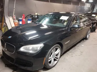 2014 BMW 7 Series ALPINA B7 xDrive with VIN WBAYF8C53ED141858, listed as a IAAI auction lot 40987098 with 128,404 mi miles and . Bid and sale history available at DreamBid. Image 17.