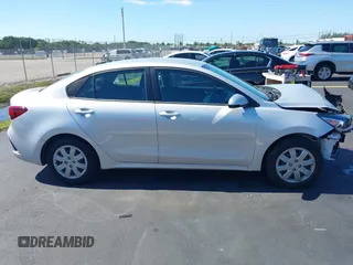 2023 Kia Rio S z VIN 3KPA24AD4PE592446, wystawiony jako IAAI lot #42244022 z przebiegiem 13 759 mil mil oraz . Historia ofert i sprzedaży dostępna na DreamBid. Obrazek 14.