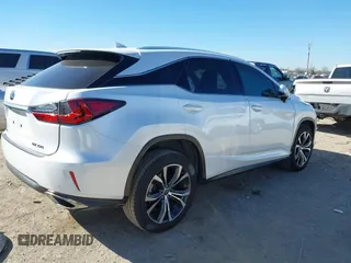 2018 Lexus RX 350 z VIN 2T2ZZMCAXJC106256, wystawiony jako IAAI lot #41658817 z przebiegiem 103 733 mil mil oraz . Historia ofert i sprzedaży dostępna na DreamBid. Obrazek 4.