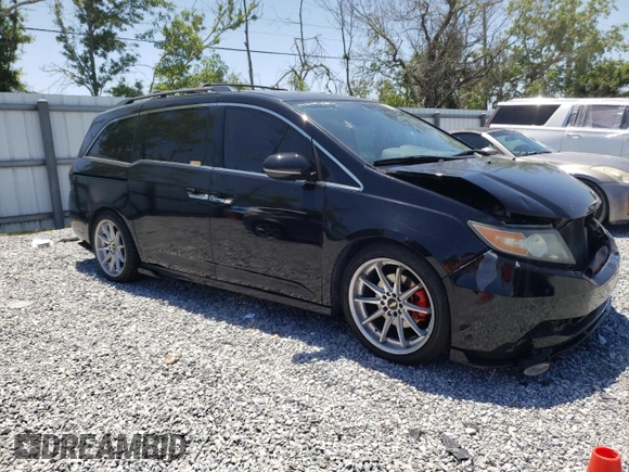 2014 Honda Odyssey Touring with VIN 5FNRL5H97EB016624, listed as a Copart auction lot 53444645 with 244,126 mi miles and Salvage Title. Bid and sale history available at DreamBid. Image 4.