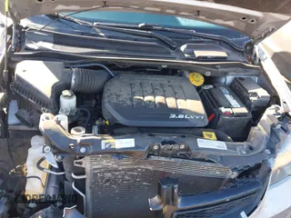 2016 Dodge Grand Caravan SE with VIN 2C4RDGBGXGR217926, listed as a IAAI auction lot 41631102 with 89,027 mi miles and . Bid and sale history available at DreamBid. Image 10.