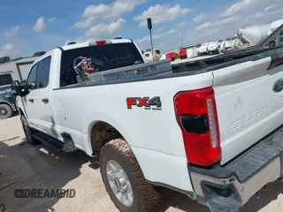 2023 Ford F-250 XL with VIN 1FT7W2BT2PEC64642, listed as a IAAI auction lot 42661561 with 22,936 mi miles and . Bid and sale history available at DreamBid. Image 14.