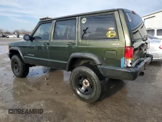 1997 Jeep Cherokee SE with VIN 1J4FJ28S5VL551419, listed as a Copart auction lot 42241185 with 239,699 mi miles and Salvage Title. Bid and sale history available at carsss.com. Image 2.