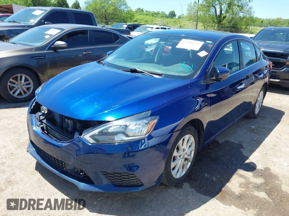 2018 Nissan Sentra SV z VIN 3N1AB7APXJY266879, wystawiony jako IAAI lot #42106571 z przebiegiem 140 050 mil mil oraz . Historia ofert i sprzedaży dostępna na DreamBid. Obrazek 2.