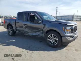2023 Ford F-150 XL with VIN 1FTEW1CP4PKD21685, listed as a Copart auction lot 54992615 with 27,252 mi miles and Salvage title. Bid and sale history available at DreamBid. Image 4.