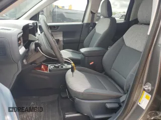 2023 Ford Maverick XL with VIN 3FTTW8E93PRA57918, listed as a Copart auction lot 55580585 with 2,013 mi miles and Salvage Title. Bid and sale history available at DreamBid. Image 7.