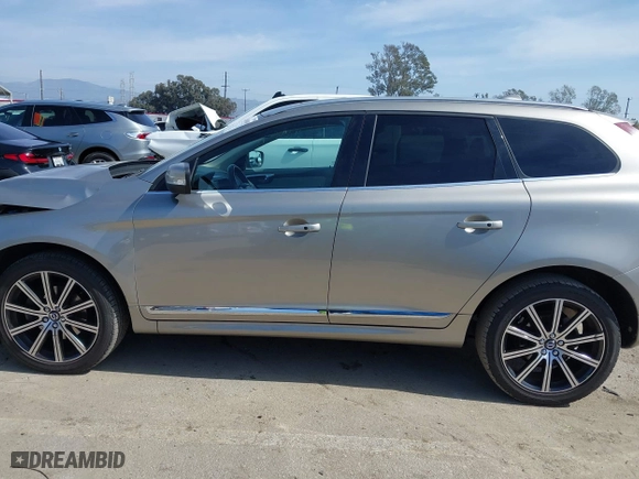 2016 Volvo XC60 T5 Drive-E Premier with VIN YV440MDK1G2854334, listed as a IAAI auction lot 41580888 with 49,765 mi miles. Bid and sale history available at carsss.com. Image 14.