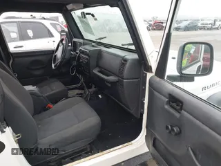 2006 Jeep Wrangler Rubicon with VIN 1J4FA69S16P710601, listed as a IAAI auction lot 41475818 with Not provided miles and . Bid and sale history available at DreamBid. Image 5.
