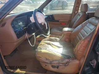 1998 Jeep Grand Cherokee Laredo with VIN 1J4GZ48S4WC239246, listed as a Copart auction lot 86101204 with 0 mi miles and Salvage Title. Bid and sale history available at carsss.com. Image 7.