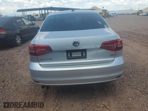 2015 Volkswagen Jetta SE with VIN 3VWD17AJ8FM265086, listed as a Copart auction lot 65084745 with 82,287 mi miles and Salvage title. Bid and sale history available at DreamBid. Image 6.