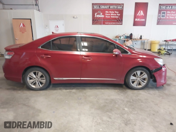 2010 Lexus HS 250h z VIN JTHBB1BAXA2005211, wystawiony jako IAAI lot #41884955 z przebiegiem 214 578 mil mil oraz . Historia ofert i sprzedaży dostępna na DreamBid. Obrazek 14.