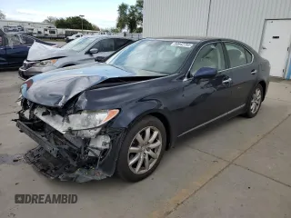 2009 Lexus LS 460 with VIN JTHBL46FX95086953, listed as a Copart auction lot 50642785 with 122,293 mi miles and Salvage Title. Bid and sale history available at carsss.com. Image 1.
