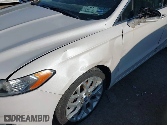 2014 Ford Fusion Titanium with VIN 3FA6P0K95ER128961, listed as a IAAI auction lot 42750668 with 197,188 mi miles and . Bid and sale history available at DreamBid. Image 6.