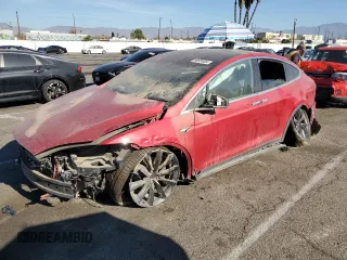 2020 Tesla Model X Long Range with VIN 5YJXCAE24LF234394, listed as a Copart auction lot 86634404 with 59,976 mi miles and Salvage Title. Bid and sale history available at carsss.com. Image 1.