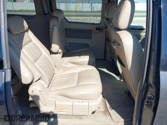 2007 Ford Freestar SEL z VIN 2FMDA52257BA11056, wystawiony jako IAAI lot #42177243 z przebiegiem 171 532 mil mil oraz . Historia ofert i sprzedaży dostępna na DreamBid. Obrazek 8.