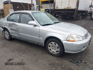 1997 Honda Civic EX with VIN 2HGEJ8643VH561244, listed as a IAAI auction lot 41810988 with 130,000 mi miles. Bid and sale history available at carsss.com. Image 1.
