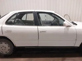 1995 Toyota Camry LE z VIN JT2SK12E8S0299203, wystawiony jako IAAI lot #39607993 z przebiegiem 193 374 mil mil oraz . Historia ofert i sprzedaży dostępna na DreamBid. Obrazek 13.