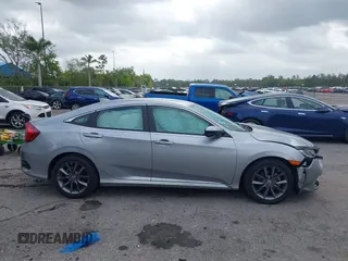 2021 Honda Civic Sedan EX-L with VIN 19XFC1F77ME008461, listed as a IAAI auction lot 41920231 with 31,912 mi miles. Bid and sale history available at carsss.com. Image 13.