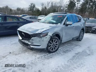 2021 Mazda CX-5 Grand Touring Reserve with VIN JM3KFBAY0M0377030, listed as a IAAI auction lot 41606709 with 39,590 mi miles. Bid and sale history available at carsss.com. Image 2.