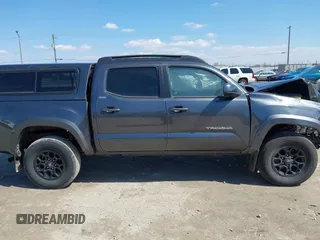 2021 Toyota Tacoma 4WD SR with VIN 3TMCZ5AN7MM442237, listed as a IAAI auction lot 41993450 with 30,148 mi miles. Bid and sale history available at carsss.com. Image 14.