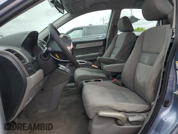 2011 Honda CR-V LX z VIN 5J6RE3H31BL045520, wystawiony jako Copart lot #59717755 z przebiegiem 166 163 mil mil oraz Szkoda całkowita • Salvage title. Historia ofert i sprzedaży dostępna na DreamBid. Obrazek 7.
