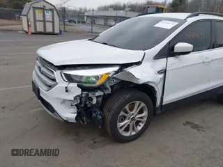 2018 Ford Escape SE z VIN 1FMCU9GD2JUC77186, wystawiony jako IAAI lot #41308133 z przebiegiem 123 156 mil mil oraz . Historia ofert i sprzedaży dostępna na DreamBid. Obrazek 6.