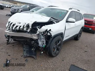 2016 Jeep Cherokee Latitude with VIN 1C4PJMCSXGW214243, listed as a IAAI auction lot 40850362 with 96,240 mi miles and . Bid and sale history available at carsss.com. Image 17.