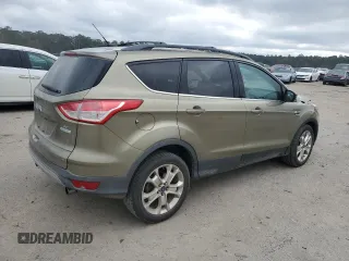 2013 Ford Escape SE with VIN 1FMCU0GX2DUB80872, listed as a Copart auction lot 85800144 with 98,304 mi miles and Salvage Title. Bid and sale history available at DreamBid. Image 3.