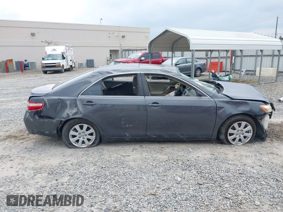 2009 Toyota Camry LE z VIN 4T1BK46KX9U594987, wystawiony jako IAAI lot #42039029 z przebiegiem 156 812 mil mil oraz . Historia ofert i sprzedaży dostępna na DreamBid. Obrazek 14.