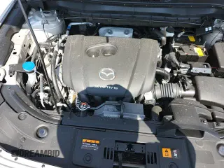 2025 Mazda CX-5 S Select z VIN JM3KFBBL3S0554962, wystawiony jako Copart lot #67968865 z przebiegiem 1 687 mil mil oraz Szkoda całkowita • Salvage title. Historia ofert i sprzedaży dostępna na DreamBid. Obrazek 13.