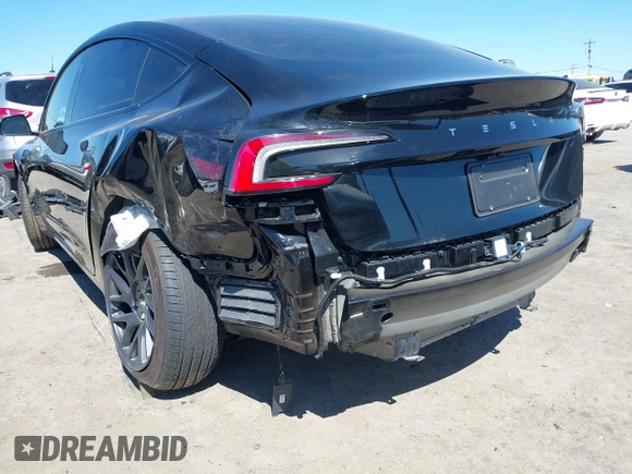 2025 Tesla Model 3 Long Range with VIN 5YJ3E1EA5SF919681, listed as a IAAI auction lot 41818042 with 2,173 mi miles and . Bid and sale history available at DreamBid. Image 21.