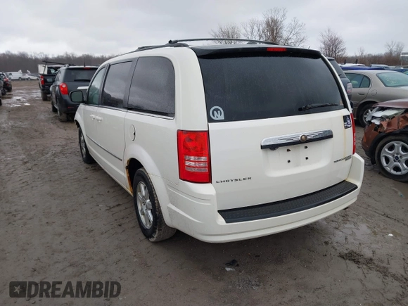 2010 Chrysler Town & Country Touring with VIN 2A4RR5D19AR441155, listed as a IAAI auction lot 41848553 with 197,088 mi miles. Bid and sale history available at carsss.com. Image 3.