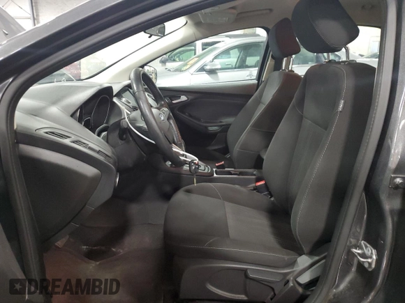 2017 Ford Focus SE with VIN 1FADP3F21HL205754, listed as a Copart auction lot 63632985 with 96,797 mi miles and Salvage title. Bid and sale history available at DreamBid. Image 7.
