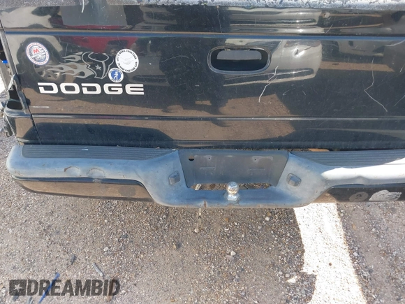 2003 Dodge Dakota Sport with VIN 1D7HL38X63S228581, listed as a IAAI auction lot 41835200 with 273,562 mi miles and . Bid and sale history available at DreamBid. Image 6.