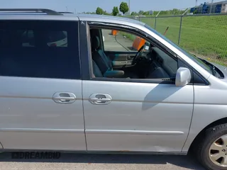 2003 Honda Odyssey EX-L with VIN 5FNRL18983B050769, listed as a IAAI auction lot 42113963 with 287,552 mi miles and . Bid and sale history available at DreamBid. Image 6.