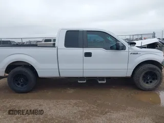 2014 Ford F-150 XL with VIN 1FTFX1CFXEKF94927, listed as a IAAI auction lot 42441473 with 127,857 mi miles and . Bid and sale history available at DreamBid. Image 13.
