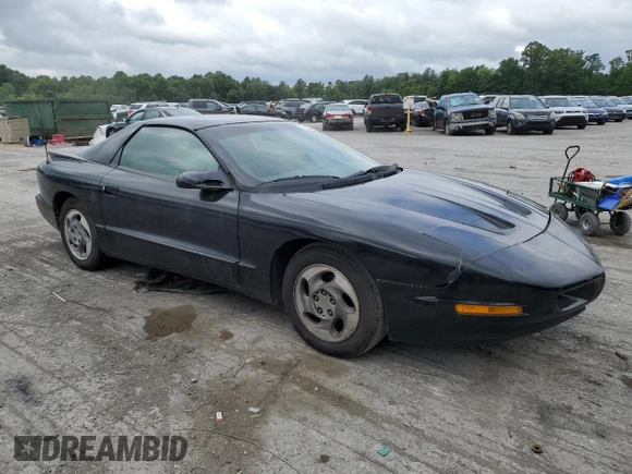 1995 Pontiac Firebird Firebird with VIN 2G2FS22S1S2215990, listed as a Copart auction lot 85984594 with 141,363 mi miles and Salvage title. Bid and sale history available at DreamBid. Image 4.