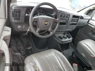 2014 Chevrolet Express Cargo Van with VIN 1GCWGGBA1E1193958, listed as a Copart auction lot 77208494 with 126,193 mi miles and Clean Title. Bid and sale history available at carsss.com. Image 8.
