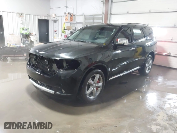 2012 Dodge Durango Citadel with VIN 1C4RDJEG8CC292006, listed as a IAAI auction lot 41553408 with 147,954 mi miles and . Bid and sale history available at DreamBid. Image 18.