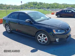 2014 Volkswagen Jetta GLI with VIN 3VW4T7AJ5EM382195, listed as a IAAI auction lot 39211126 with 94,735 mi miles and . Bid and sale history available at DreamBid. Image 1.