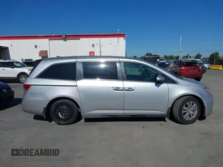 2014 Honda Odyssey EX-L with VIN 5FNRL5H63EB041106, listed as a IAAI auction lot 42294113 with 122,610 mi miles and . Bid and sale history available at DreamBid. Image 14.